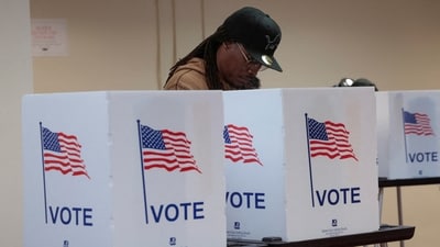 A person votes in the U.S. presidential election at a polling station in Detroit, Michigan (REUTERS)