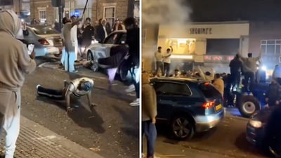 In the video, men climb cars, jump and dance as one of them starts doing push-ups on the road. (X/@harpreet4567) In the video, men climb cars, jump and dance as one of them starts doing push-ups on the road. (X/@harpreet4567)