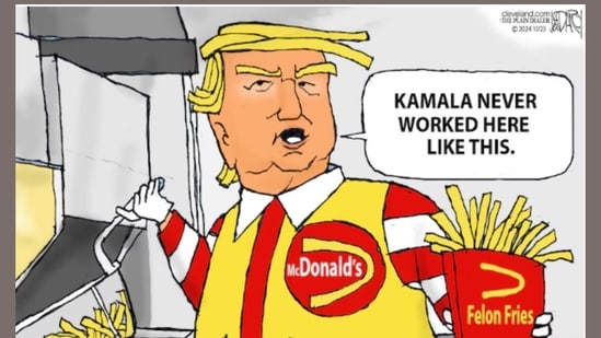 Jeff Darcy's (Cleveland) satirical take on Donald Trump's claims that Kamala Harris never worked at McDonald's as the former president manned the fries station for a photo-op.(Cleveland.com)