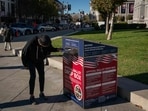 A voter drops off ballots at an official ballot drop box on the final day of early voting ahead of Election Day at City Hall on November 4, 2024 in San Francisco, California. A voter drops off ballots at an official ballot drop box on the final day of early voting ahead of Election Day at City Hall on November 4, 2024 in San Francisco, California.