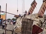 Rescue operation underway to save four workers trapped under the debris after a bridge collapsed, in Gujarat's Anand, Tuesday. Rescue operation underway to save four workers trapped under the debris after a bridge collapsed, in Gujarat's Anand, Tuesday.