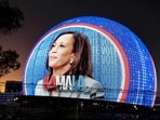 Trump International hotel is seen in the background of the Sphere, entertainment arena, displaying an portrait of US Vice President and democratic Presidential candidate Kamala Harris in Las Vegas, Nevada on November 4.