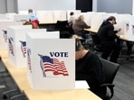 People cast their ballots on the last day of early voting for the general election in Michigan. People cast their ballots on the last day of early voting for the general election in Michigan.