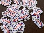 "I voted" stickers are seen during early voting for the US general election at a polling station at Ottawa Hills High School in Grand Rapids, Michigan, on November 3 2024. (Photo by KAMIL KRZACZYNSKI / AFP)