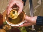 The potatoes used for stuffing the puris were rotten, while the onions were also decayed.
