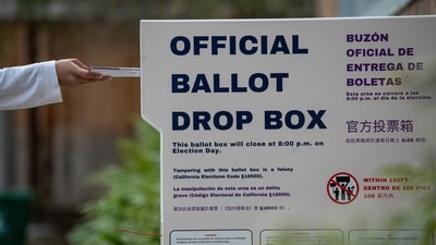 A voter submits their ballot at an official ballot drop box at a polling location for the 2024 Presidential election in Hercules, California, US, on Tuesday, Nov. 5, 2024. Photographer: David Paul Morris/Bloomberg (Bloomberg) A voter submits their ballot at an official ballot drop box at a polling location for the 2024 Presidential election in Hercules, California, US, on Tuesday, Nov. 5, 2024. Photographer: David Paul Morris/Bloomberg (Bloomberg)