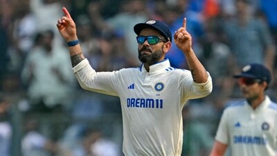 India's Virat Kohli during the first day of the third Test cricket match between India and New Zealand. (Photo by INDRANIL MUKHERJEE / AFP) (AFP) India's Virat Kohli during the first day of the third Test cricket match between India and New Zealand. (Photo by INDRANIL MUKHERJEE / AFP) (AFP)
