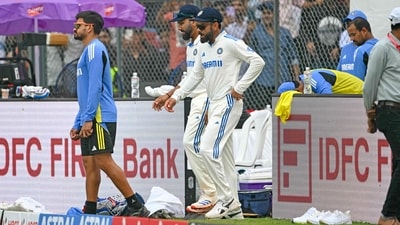India's Virat Kohli (C) and captain Rohit Sharma arrive for the second innings on the second day of the third Test cricket match between India and New Zealand at the Wankhede stadium in Mumbai on November 2 (AFP) India's Virat Kohli (C) and captain Rohit Sharma arrive for the second innings on the second day of the third Test cricket match between India and New Zealand at the Wankhede stadium in Mumbai on November 2 (AFP)