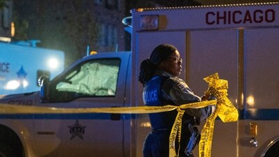 Chicago police work the scene of a shooting in the Chatham neighborhood of Chicago, Monday, Nov. 4, 2024. (Tyler Pasciak LaRiviere/Chicago Sun-Times via AP) (AP) Chicago police work the scene of a shooting in the Chatham neighborhood of Chicago, Monday, Nov. 4, 2024. (Tyler Pasciak LaRiviere/Chicago Sun-Times via AP) (AP)
