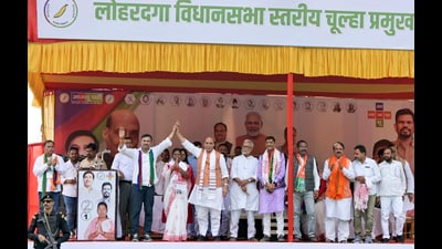 Defence Minister Rajnath Singh with All Jharkhand Student Union (AJSU) Chief Sudesh Mahato during an election campaign ahead of the Jharkhand Assembly elections, in Lohardaga district. (PTI) Defence Minister Rajnath Singh with All Jharkhand Student Union (AJSU) Chief Sudesh Mahato during an election campaign ahead of the Jharkhand Assembly elections, in Lohardaga district. (PTI)