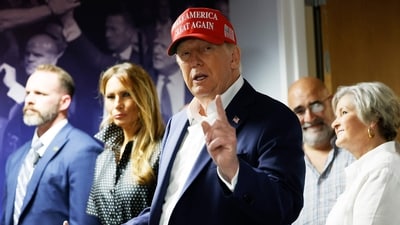 Republican presidential nominee former President Donald Trump thanks his staff at his campaign headquarters on Election Day, November 05, 2024 in West Palm Beach, Florida. (AFP) Republican presidential nominee former President Donald Trump thanks his staff at his campaign headquarters on Election Day, November 05, 2024 in West Palm Beach, Florida. (AFP)