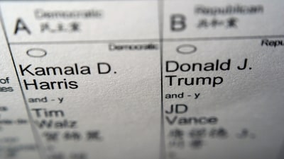 Candidates for president and vice president of the United States, Democrats Vice President Kamala Harris and Minnesota Gov. Tim Walz, and Republicans former President Donald Trump and Sen. JD Vance, R-Ohio, are seen on part of a mail-in election ballot in New York on Sunday, Nov. 3, 2024. (AP Photo/Patrick Sison) (AP) Candidates for president and vice president of the United States, Democrats Vice President Kamala Harris and Minnesota Gov. Tim Walz, and Republicans former President Donald Trump and Sen. JD Vance, R-Ohio, are seen on part of a mail-in election ballot in New York on Sunday, Nov. 3, 2024. (AP Photo/Patrick Sison) (AP)