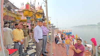 Mathura district magistrate Shailendra Singh and SSP Shailesh Pandey conducting a spot inspection at Vishram Ghat on the Yamuna in Mathura on Tuesday. (HT Photo) Mathura district magistrate Shailendra Singh and SSP Shailesh Pandey conducting a spot inspection at Vishram Ghat on the Yamuna in Mathura on Tuesday. (HT Photo)