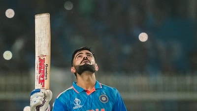 Virat Kohli celebrates after scoring his 49th ODI century during India's match against South Africa at the 2023 World Cup in Kolkata. (PTI) Virat Kohli celebrates after scoring his 49th ODI century during India's match against South Africa at the 2023 World Cup in Kolkata. (PTI)