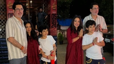 Rupali Ganguly, Ashwin Verma and their son pose outside a Mumbai theatre. Rupali Ganguly, Ashwin Verma and their son pose outside a Mumbai theatre.