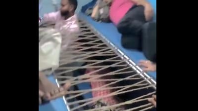 A viral video showed a passenger weaving a hammock in a packed train, amusing fellow commuters. (X/@gaju_gade) A viral video showed a passenger weaving a hammock in a packed train, amusing fellow commuters. (X/@gaju_gade)