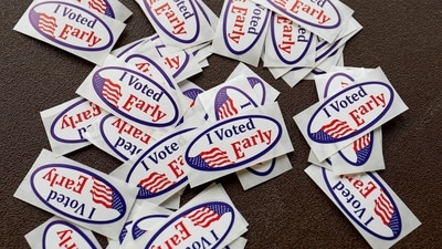 "I voted" stickers are seen during early voting for the US general election at a polling station at Ottawa Hills High School in Grand Rapids, Michigan, on November 3 2024. (Photo by KAMIL KRZACZYNSKI / AFP) (AFP) "I voted" stickers are seen during early voting for the US general election at a polling station at Ottawa Hills High School in Grand Rapids, Michigan, on November 3 2024. (Photo by KAMIL KRZACZYNSKI / AFP) (AFP)