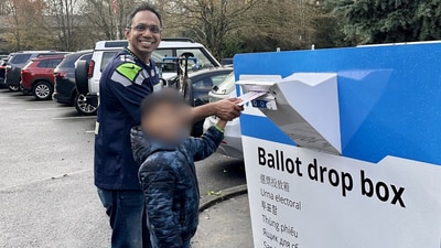 Srini Iragavarapu, who is the director of generative AI applications at Amazon, shared a photo of himself with his son at a ballot box. (LinkedIn/isvas) Srini Iragavarapu, who is the director of generative AI applications at Amazon, shared a photo of himself with his son at a ballot box. (LinkedIn/isvas)