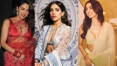 It is officially the return of plunging neckline blouses.
