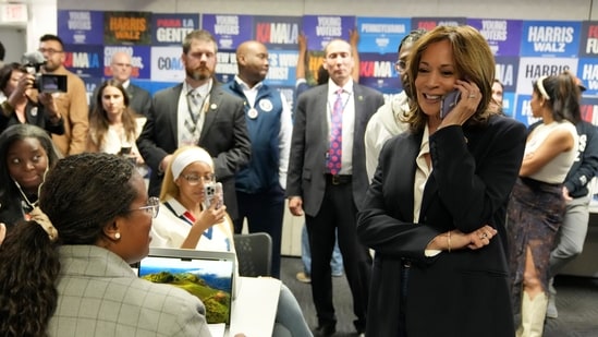 Democratic presidential nominee Vice President Kamala Harris, right, phone banks with volunteers at the DNC headquarters on Election Day, Tuesday, Nov. 5, 2024, in Washington. (AP Photo/Jacquelyn Martin) (AP)