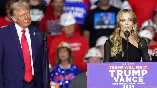 Republican presidential nominee former President Donald Trump listens as Megyn Kelly speaks at a campaign rally at PPG Paints Arena, Monday, Nov. 4, 2024, in Pittsburgh. (AP Photo/Matt Freed) (AP)