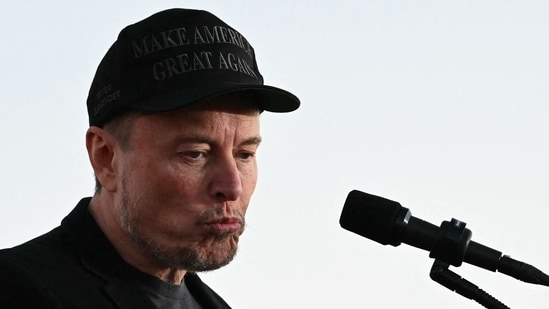 (FILES) Tesla CEO Elon Musk speaks on stage during a campaign rally with former US President and Republican presidential candidate Donald Trump at site of his first assassination attempt in Butler, Pennsylvania on October 5, 2024. Billionaire Elon Musk was expected in court in Philadelphia on October 31, 2024, after a judge ordered him to attend a hearing in a lawsuit seeking to halt his $1 million giveaways to registered US voters in swing states. (Photo by Jim WATSON / AFP) (AFP)