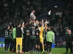 Sporting Lisbon's Portuguese coach Ruben Amorim is celebrated by his players at the end of the UEFA Champions League, league phase day 4 football match between Sporting Lisbon and Manchester City Sporting Lisbon's Portuguese coach Ruben Amorim is celebrated by his players at the end of the UEFA Champions League, league phase day 4 football match between Sporting Lisbon and Manchester City