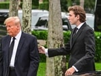 Former US President Donald Trump and his son Barron Trump attend the funeral of former first lady Melania Trump's mother Amalija Knavs, 