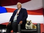 West Virginia Gov. Jim Justice checks out the stage with his dog, "Babydog," before the Republican National Convention. West Virginia Gov. Jim Justice checks out the stage with his dog, "Babydog," before the Republican National Convention.