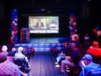 People attend a Democratic watch party as they wait for US election results in Orlando, Florida. People attend a Democratic watch party as they wait for US election results in Orlando, Florida.