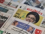 A newspaper with a picture of Republican presidential nominee and former U.S. President Donald Trump and Democratic presidential nominee U.S. Vice President Kamala Harris is seen in Tehran, Iran November 6, 2024.