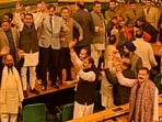 Bharatiya Janata Party (BJP) members shout slogans against the resolution passed by Jammu and Kashmir assembly seeking the restoration of special status. 