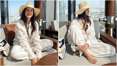 In one of the pictures, Shanaya is seen wearing a black bikini top paired with a white open-button shirt and trousers. Styled with a beige hat, she looks effortlessly stylish. (Instagram/@shanayakapoor02) In one of the pictures, Shanaya is seen wearing a black bikini top paired with a white open-button shirt and trousers. Styled with a beige hat, she looks effortlessly stylish. (Instagram/@shanayakapoor02)