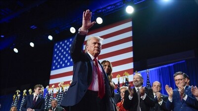 Republican presidential nominee former President Donald Trump waves as he walks with former first lady Melania Trump at an election night watch party at the Palm Beach Convention Center (AP) Republican presidential nominee former President Donald Trump waves as he walks with former first lady Melania Trump at an election night watch party at the Palm Beach Convention Center (AP)