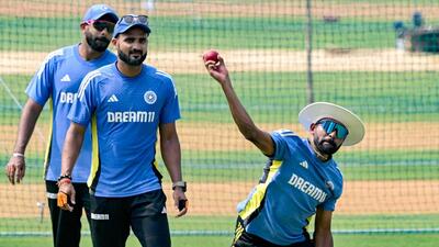 Bowlers Jasprit Bumrah (L), Akash Deep (C) and Mohammed Siraj during a practice session. (AFP) Bowlers Jasprit Bumrah (L), Akash Deep (C) and Mohammed Siraj during a practice session. (AFP)