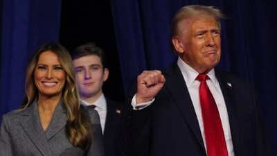 Republican presidential nominee Donald Trump makes a fist as he takes the stage at his rally, at the Palm Beach County Convention Center. (REUTERS)