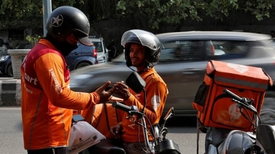 Gig workers prepare to deliver orders outside Swiggy's grocery warehouse at a market area in New Delhi, India, May 6, 2024. (Priyanshu Singh/Reuters) Gig workers prepare to deliver orders outside Swiggy's grocery warehouse at a market area in New Delhi, India, May 6, 2024. (Priyanshu Singh/Reuters)