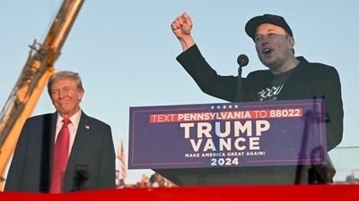 Elon Musk expressed excitement on social media by sharing posts and images showcasing Trump's lead.
(Photo by Jim WATSON / AFP) (AFP) Elon Musk expressed excitement on social media by sharing posts and images showcasing Trump's lead.
(Photo by Jim WATSON / AFP) (AFP)