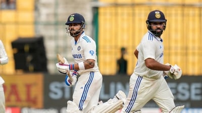 India's batters Virat Kohli and Rohit Sharma run between the wickets during the third day of the first Test cricket match between India and New Zealand (PTI) India's batters Virat Kohli and Rohit Sharma run between the wickets during the third day of the first Test cricket match between India and New Zealand (PTI)