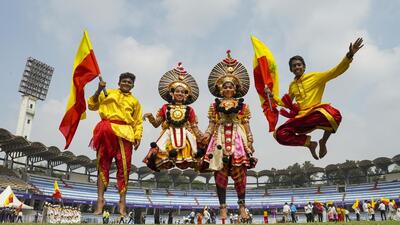 Students in 'yakshagana' attire perform during the celebrations of Karnataka state formation day 'Kannada Rajyotsava', at Sree Kanteerava Stadium in Bengaluru. (PTI) Students in 'yakshagana' attire perform during the celebrations of Karnataka state formation day 'Kannada Rajyotsava', at Sree Kanteerava Stadium in Bengaluru. (PTI)