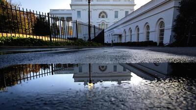 The White House is reflected in a pool of water from a ground sprinkler post-Election Day (AP) The White House is reflected in a pool of water from a ground sprinkler post-Election Day (AP)