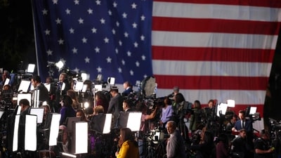 Journalists and press members work at an election night event for US Vice President and Democratic presidential candidate Kamala Harris at Howard University in Washington, DC. (AFP) Journalists and press members work at an election night event for US Vice President and Democratic presidential candidate Kamala Harris at Howard University in Washington, DC. (AFP)