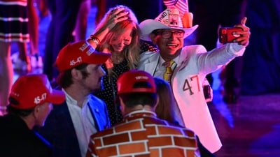 Supporters celebrate election results at an election night event with Trump at the West Palm Beach Convention Center in West Palm Beach, Florida. (Photo by Jim WATSON / AFP) (AFP) Supporters celebrate election results at an election night event with Trump at the West Palm Beach Convention Center in West Palm Beach, Florida. (Photo by Jim WATSON / AFP) (AFP)