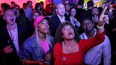 People react to early voting results during a watch party at the New York Young Republican Club watch party in Manhattan, New York City, U.S., November 5, 2024. (REUTERS)