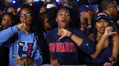 Attendees react to early election results for Republican presidential nominee and former U.S. President Donald Trump, at Democratic presidential nominee U.S. Vice President Kamala Harris' election night rally. (REUTERS)