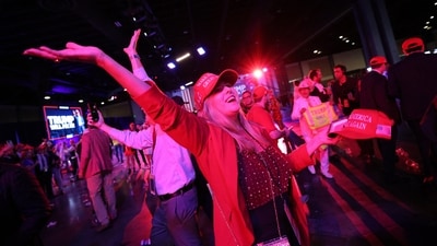 A supporter of Republican presidential nominee and former U.S. President Donald Trump celebrates at his rally in West Palm Beach, Florida. REUTERS/Carlos Barria (REUTERS)