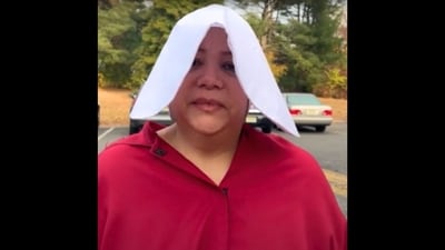 NJ mom votes in creepy Handmaid’s Tale outfit, reveals which candidate makes her feel threatened (New York Post screenshot) NJ mom votes in creepy Handmaid’s Tale outfit, reveals which candidate makes her feel threatened (New York Post screenshot)