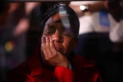 An attendee reacts at the Election Night rally for Democratic presidential nominee U.S. Vice President Kamala Harris at Howard University, in Washington, U.S., November 6, 2024. (REUTERS/Daniel Cole) (REUTERS)