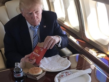 Donal Trump with a McDonald's meal Donal Trump with a McDonald's meal