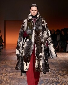 A model in a cowhide trench coat from the Bottega Veneta show (Photo: Instagram)